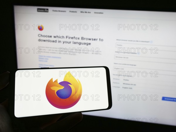 Stuttgart, Germany, 09-22-2023: Person holding cellphone with logo of open-source web browser