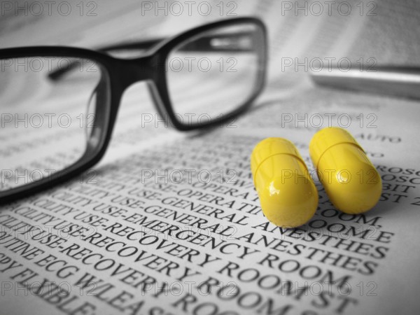 Bright Yellow Medicine On Black And White Hospital Bill