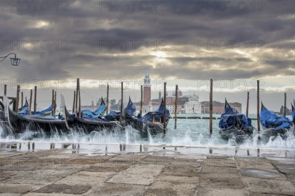 Moored Gondolas during High Tide at the St Marks Square, Venice, Italy, Europe