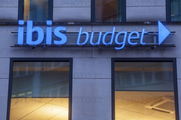 Ibis-Budget logo on an Ibis-Budget hotel at dusk, Bremen, Germany, Europe