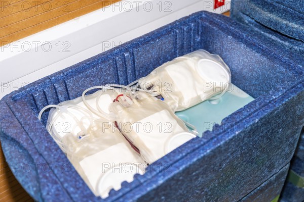 Elevated close-up view of a portable hospital refrigerators filled with bags of donated blood
