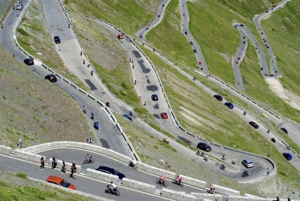 Stelvio Pass with hairpin turns, much traffic in the summer season, busy and crowded with