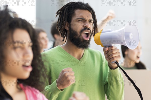 People protesting streets with megaphones