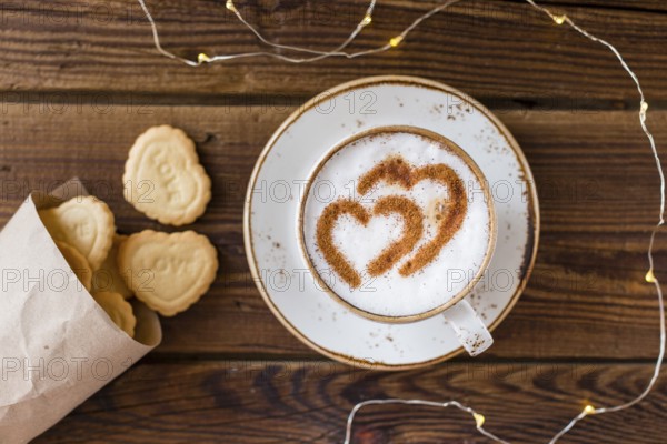 Top view coffee cup heart shaped cookies