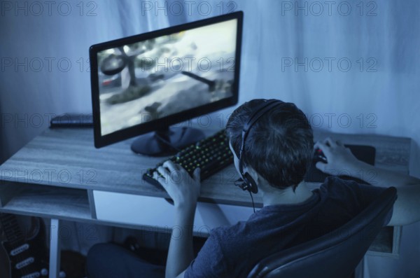 Young boy playing computer. Resolution and high quality beautiful photo