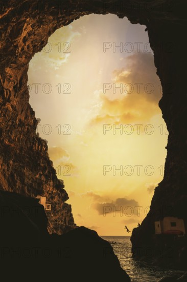 Sunset from inside the cave of the town of Poris de Candelaria on the north-west coast of the