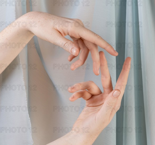 Young woman teaching sign language 2