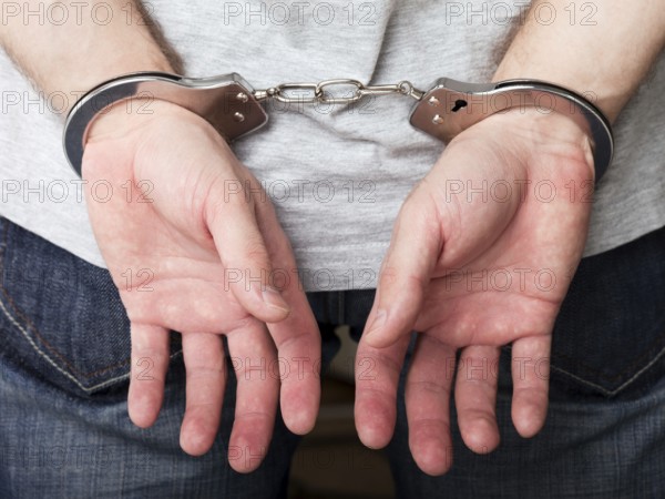 Police law steel handcuffs arrest crime human hand