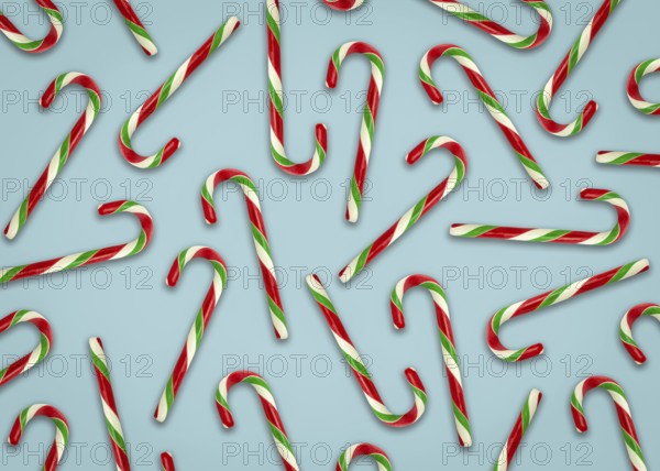 Seasonal Design For Christmas Of Candy Canes On A Blue Background