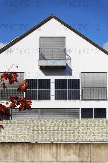 Solar panels on the wall of a detached house in Aachen, Germany, Europe