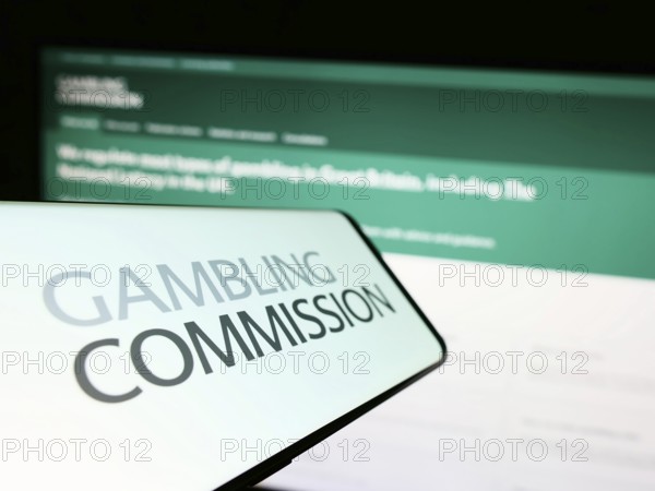 Stuttgart, Germany, 04-01-2023: Smartphone with logo of British public body Gambling Commission on