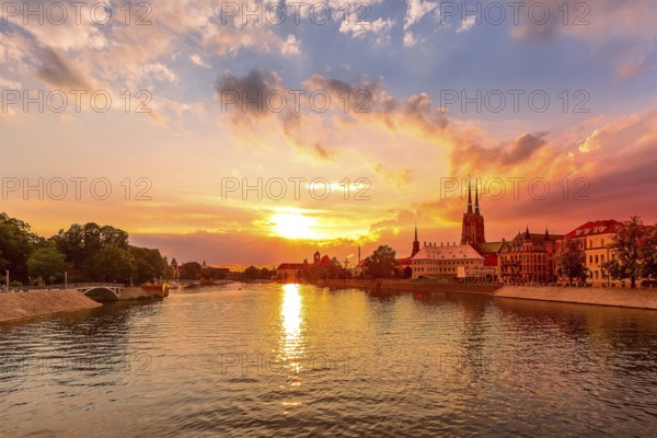 Wroclaw, Poland colorful sunset panorama with Ostrow Tumski island, Odra or Oder river and