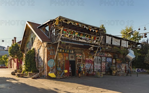 A picture of one of the main buildings of the Metelkova Art Center