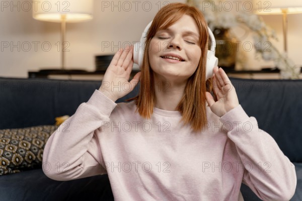 Portrait woman home listening music 6