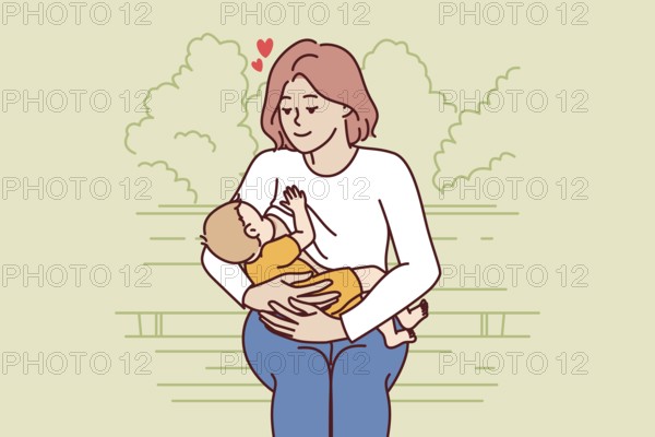 Loving mother breastfeeding baby and looks at baby lovingly sitting on park bench. Caring woman