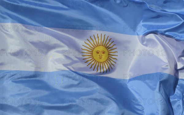 Close-up of the national flag of Argentina, fluttering in the wind with folds, wave pattern