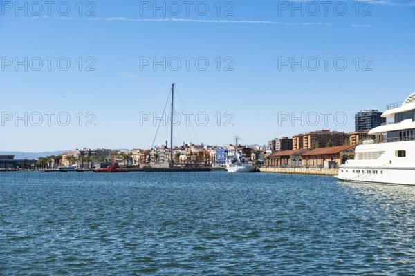 A very large luxury yacht is anchored in the harbour of Tarragona, Spain, Europe