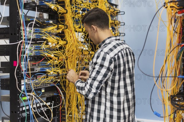 Man working ethernet switch
