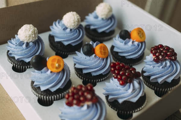 Box with yummy muffins