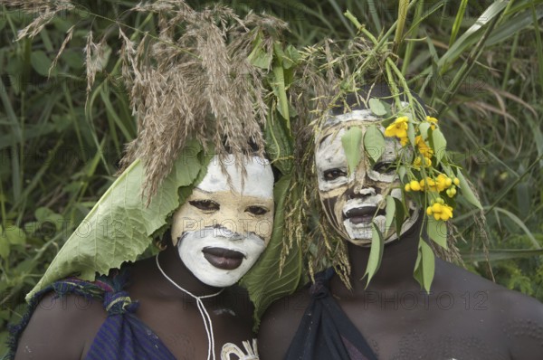 Surma woman with body painting and headdress, face painting, Kibish, Omo Valley, Ethiopia, Africa