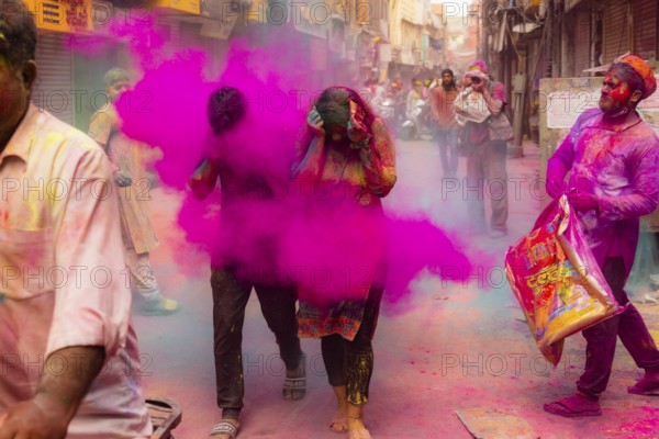Holi Festival of Colors in the streets of Mathura, India, Asia