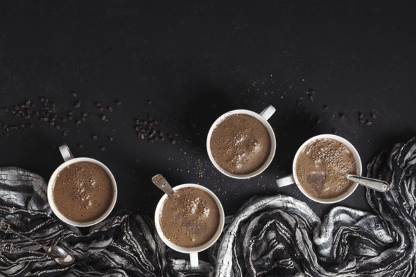 Hot chocolate mug with coffee beans