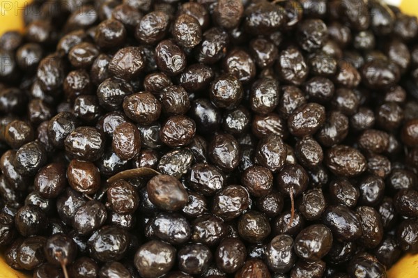 BLACK OLIVES olea europa on a market stall