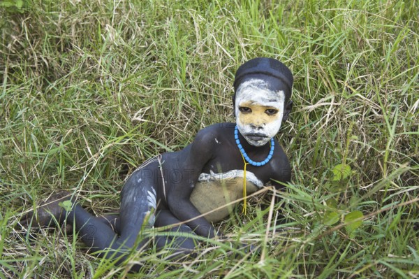 Surma boy with body painting, face painting, Kibish, Omo Valley, Ethiopia, Africa