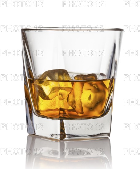 Glass of scotch whiskey and ice on a white background