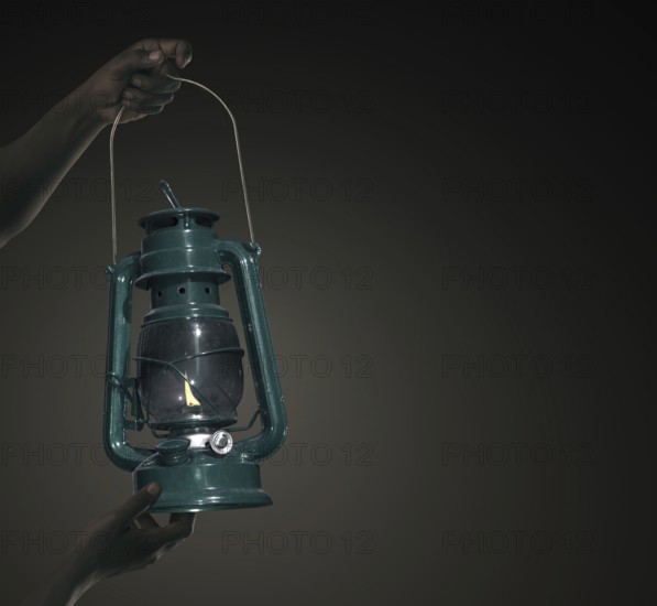 Man with a paraffin lamp
