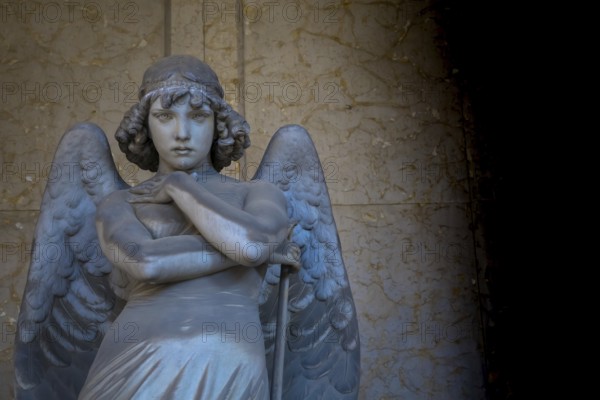GENOA, ITALY - June 2020: antique statue of angel (beginning 1900) (marble) in a Christian Catholic