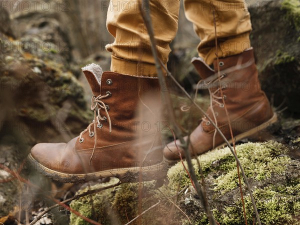 Close up boots walking forest