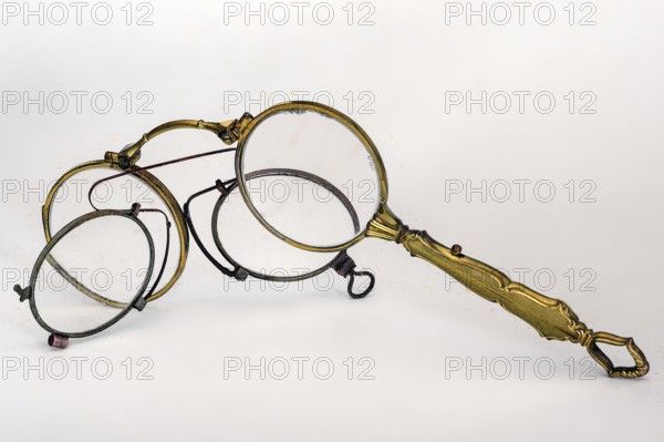 Visual aids, antique lorgnon or lorgnette and pince-nez