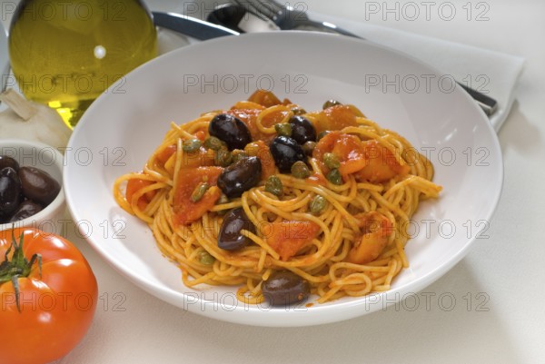 Spaghetti pasta with fresh home made puttanesca sauce