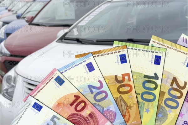 Purchase price for a car - euro banknotes with cars in the background. Purchase price for a car -