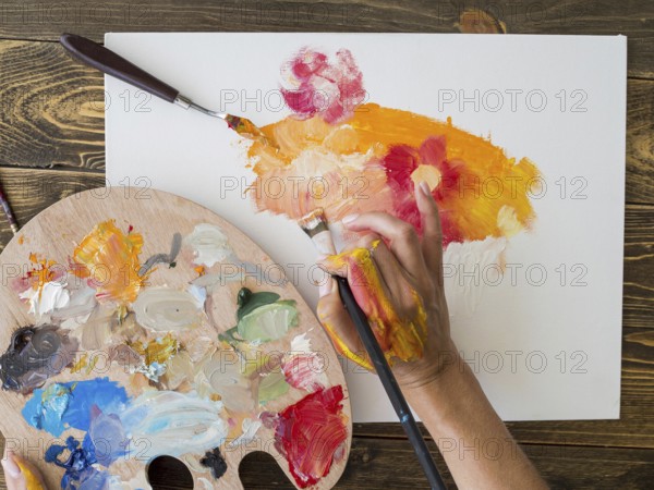 Top view artist painting with brush palette. Resolution and high quality beautiful photo