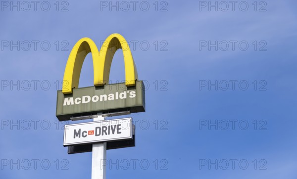A picture of McDonald's McDrive sign