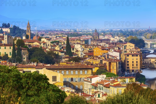 Florence, Italy city panorama with Oltrarno houses Santo Spirito tower and Ponte Vecchio bridge
