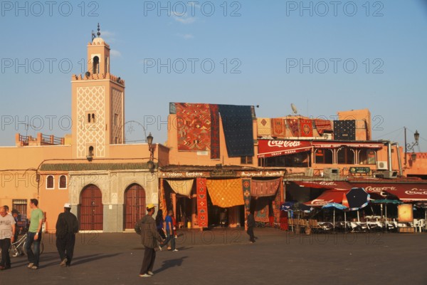 Mosque and souvenir shop on the edge of Djema el Fnaa, Marrakech Morocco