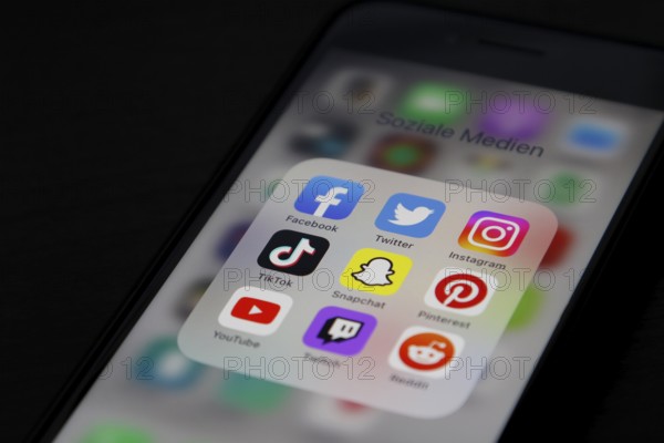 Social media icon, detailed view of a smartphone with social media apps, Facebook, Twitter,