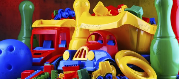 Composition with colorful plastic children toys