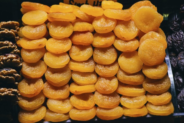 Heap of sweet dried apricots Natural dried fruits harvest concept