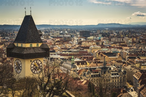 Graz, Austria, 10.03.2020: Uhrturm landmark in Graz cityscape view, Styria region of Austria.