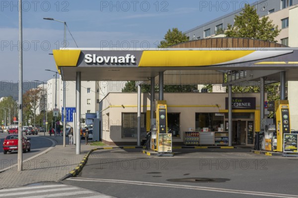 Bratislava, Slovakia, October, 16, 2022 : Fuel nozzles at a Slovnaft petrol station. Gas station.