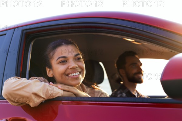 Smiley couple traveling by car