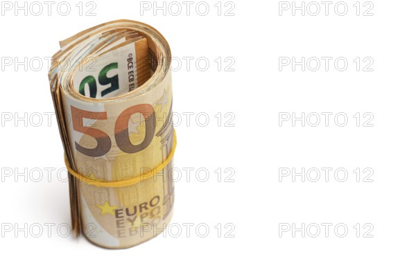 Roll of euro banknotes fastened with a rubber band isolated on a white background