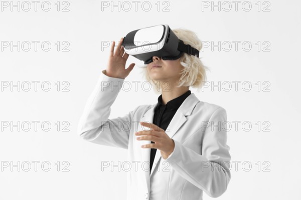 Medium shot woman with vr glasses