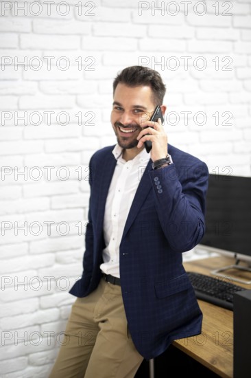 Handsome man talking phone