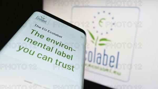 Stuttgart, Germany, 03-12-2023: Mobile phone with webpage of environmental certification EU
