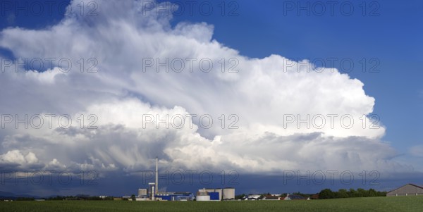 Thundercloud over the Südzucker factory, Plattling, Lower Bavaria, Germany, Europe